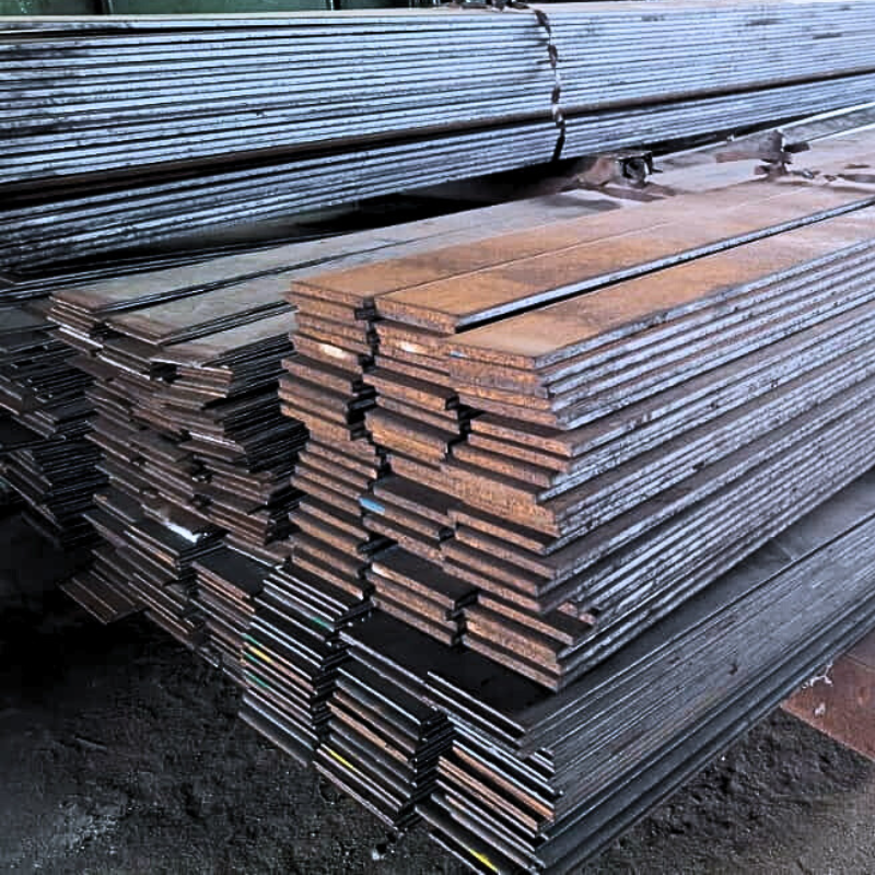 Stacked steel plates in industrial environment