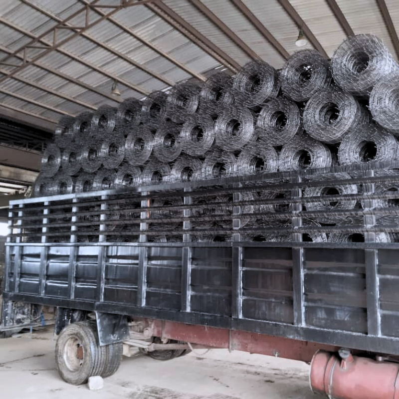 Truck carrying rolls of barbed wire in warehouse
