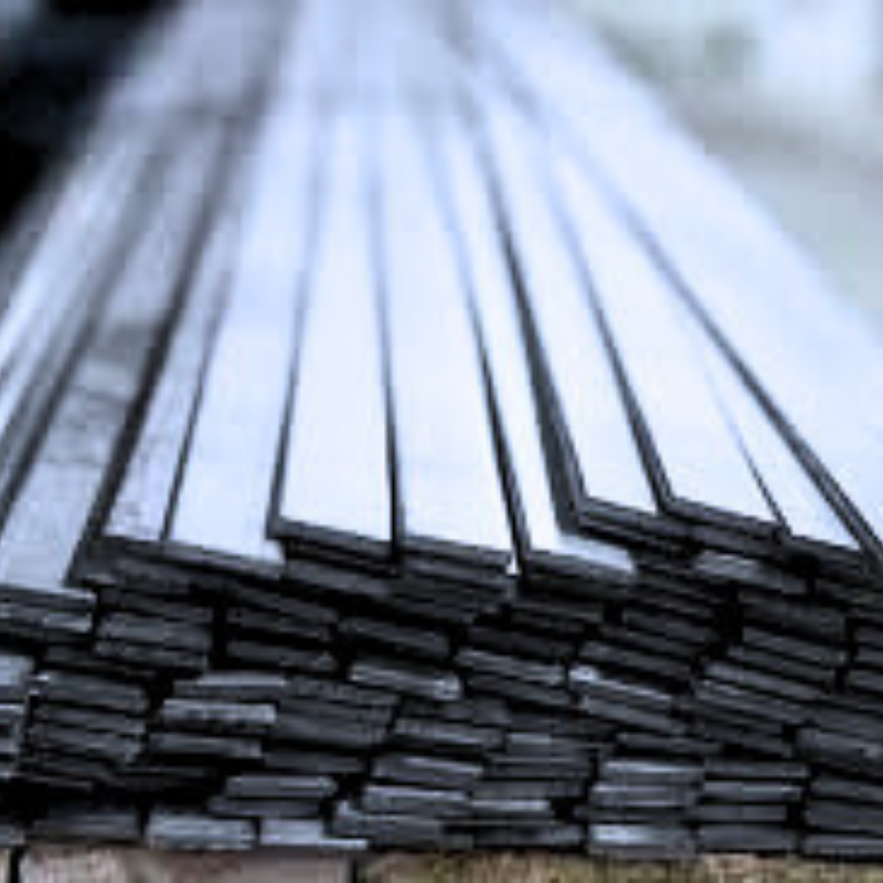 Stacked metal rods in industrial setting